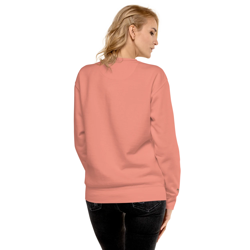 Model trägt Dusty Rose Premium-Unisex-Pullover mit Power of Mind-Design, Rückansicht – klassischer Sweatshirt für Damen und Herren, bequem und stilvoll